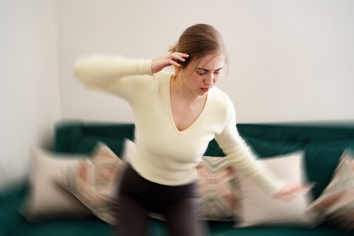 Dizziness Woman feeling dizzy nearly fall on home